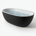 Freistehende Badewanne 170 x 80 x 58 cm aus Acryl in Schwarz Weiß - oval gerippt